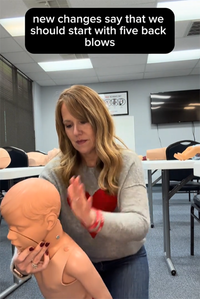 Child back blows in CPR