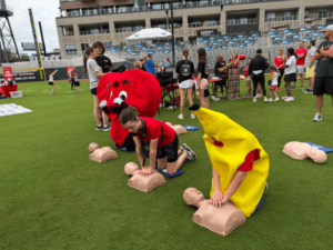 Hands-only CPR Heart man and banana costume