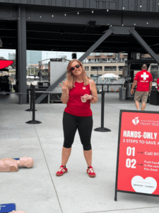 Cheryl Smith Teaching CPR at American Heart Association Heart Walk